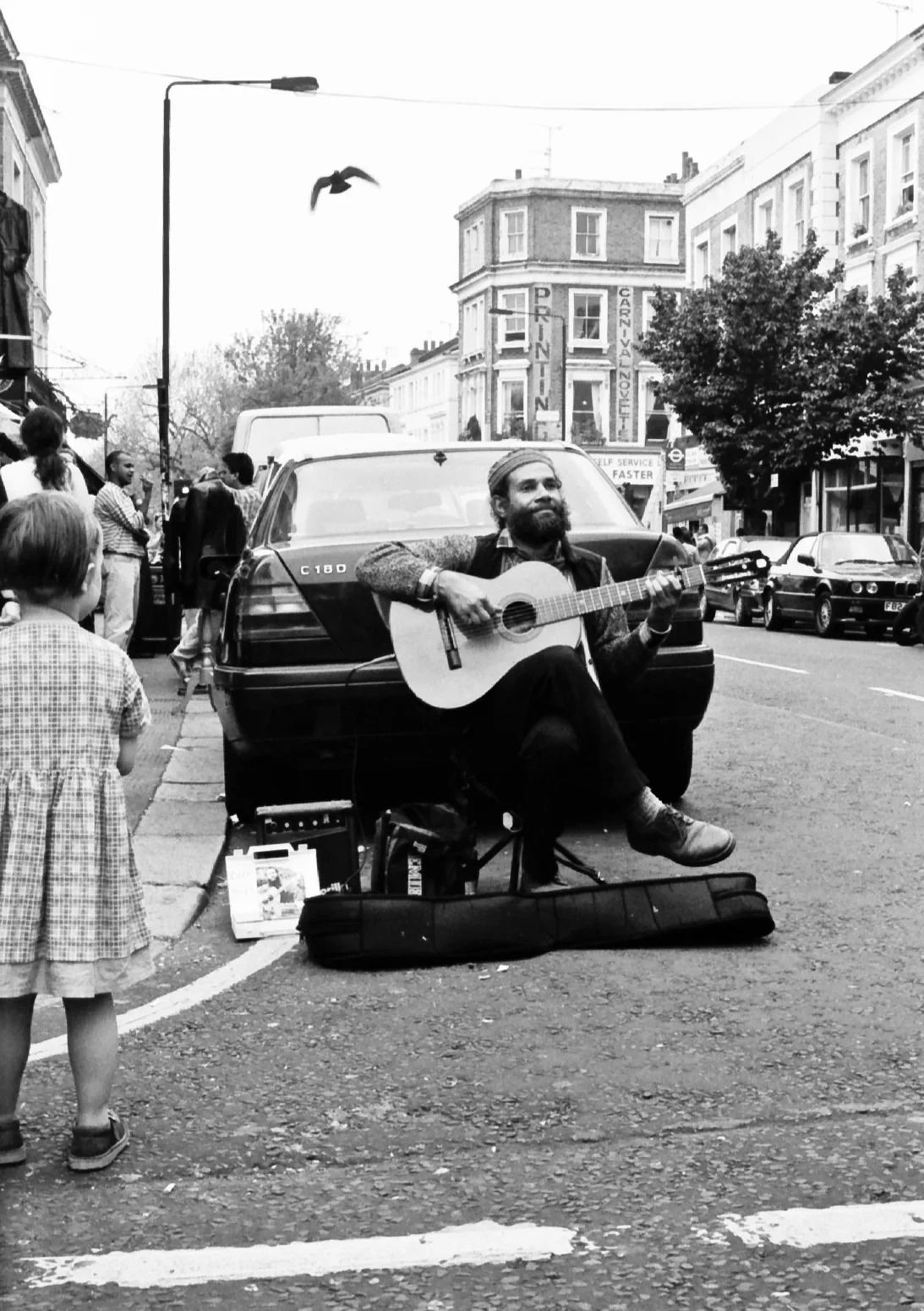 Peace song. Portobello Market, London, England. April 2000