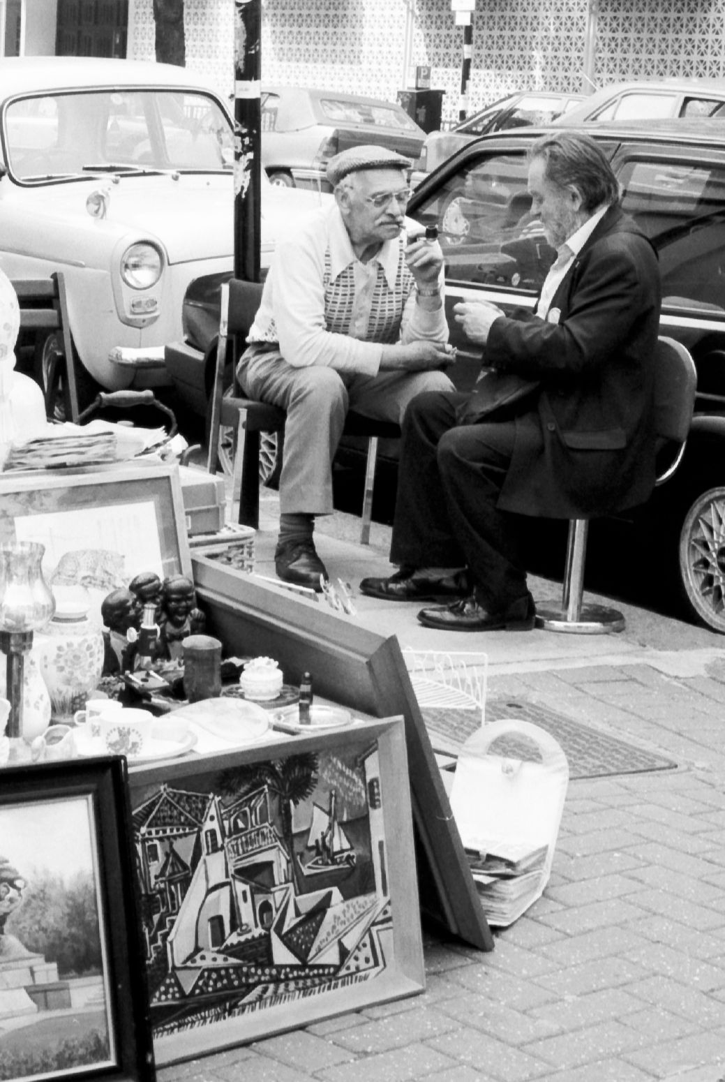 Sitting. Portobello Market, London, England. April 2000